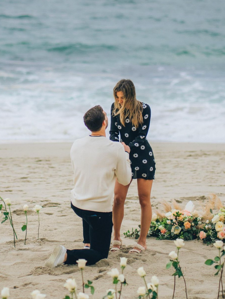 Katie Austin and her fiancée, Lane Armstrong, during their proposal, 2023